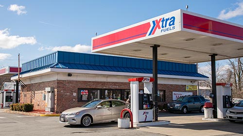 Global Partners hang for-sale sign on several properties, including this c-store/gas site in Upper Marlboro, Md.