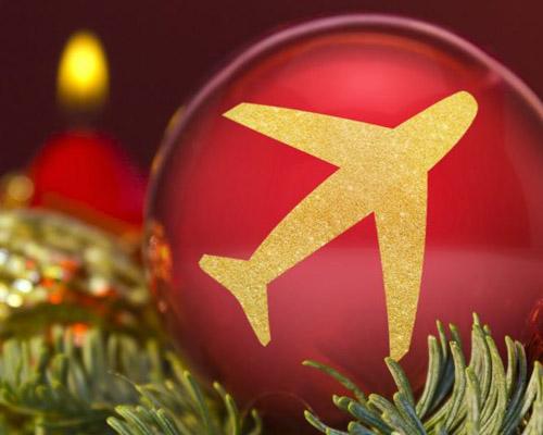 An airplane Christmas ornament for holiday travel
