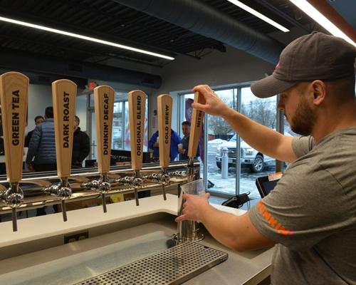 Dunkin' Donuts' signature cold beverages are now served through a tap system