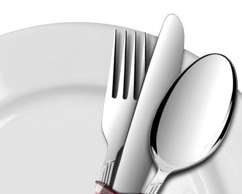dinner plate with fork, knife and spoon
