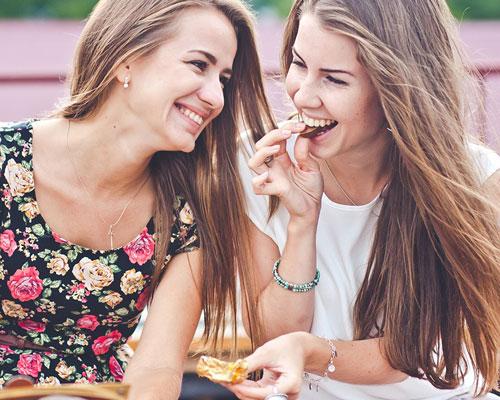 female millennials snacking