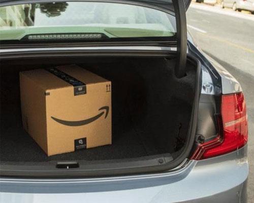 Amazon box in truck of car