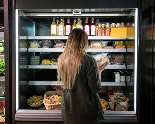 A shopper a fresh food display