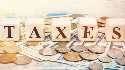 The word taxes and money