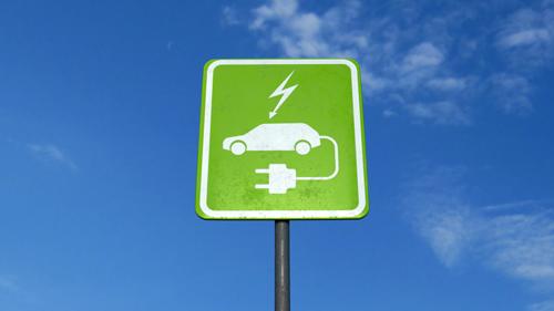 An electric vehicle charging station sign