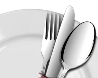 dinner plate with fork, knife and spoon