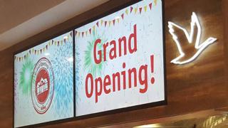 A Wawa grand opening sign