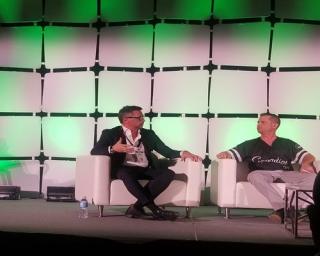 Jacopo D'Alessandris, president and CEO of E-Alternative Solutions, discusses CBD on a panel moderated by Cannapids CEO Case Mandel (r).