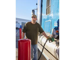 Driver pumping gas at the TA Seymour in Indiana