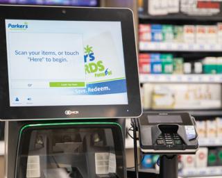 A self-checkout station at Parker's Kitchen