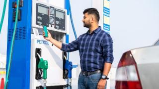 Customer paying for gas with smartphone