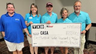 TXB donation check to Texas CASA