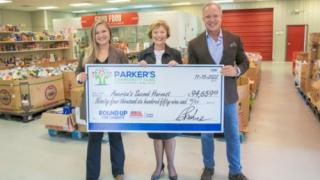 Parker's Kitchen presenting a donation to America's Second Harvest