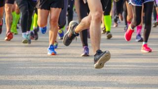 Runners' feet in RaceTrace 5K Race