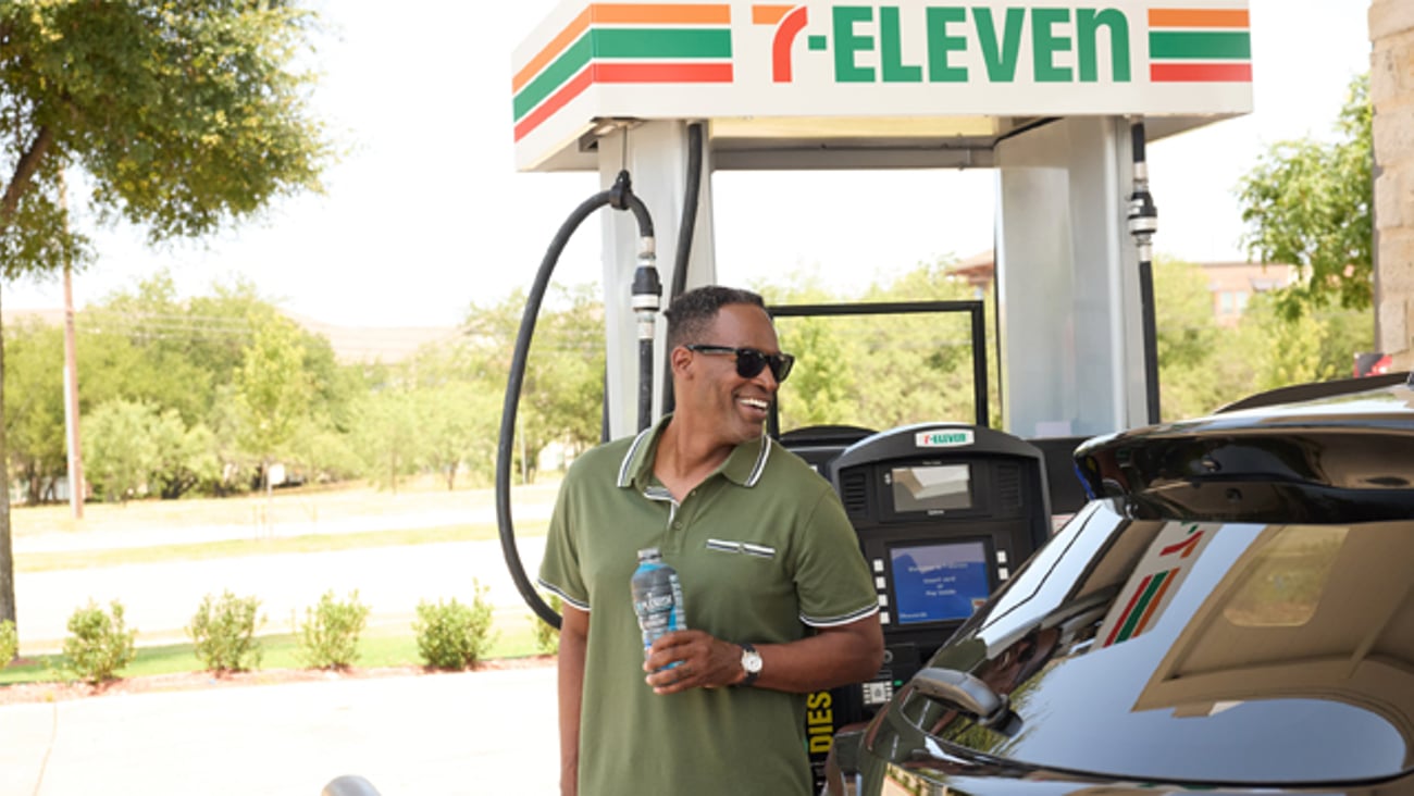 a male customer at the gas pump at 7-Eleven