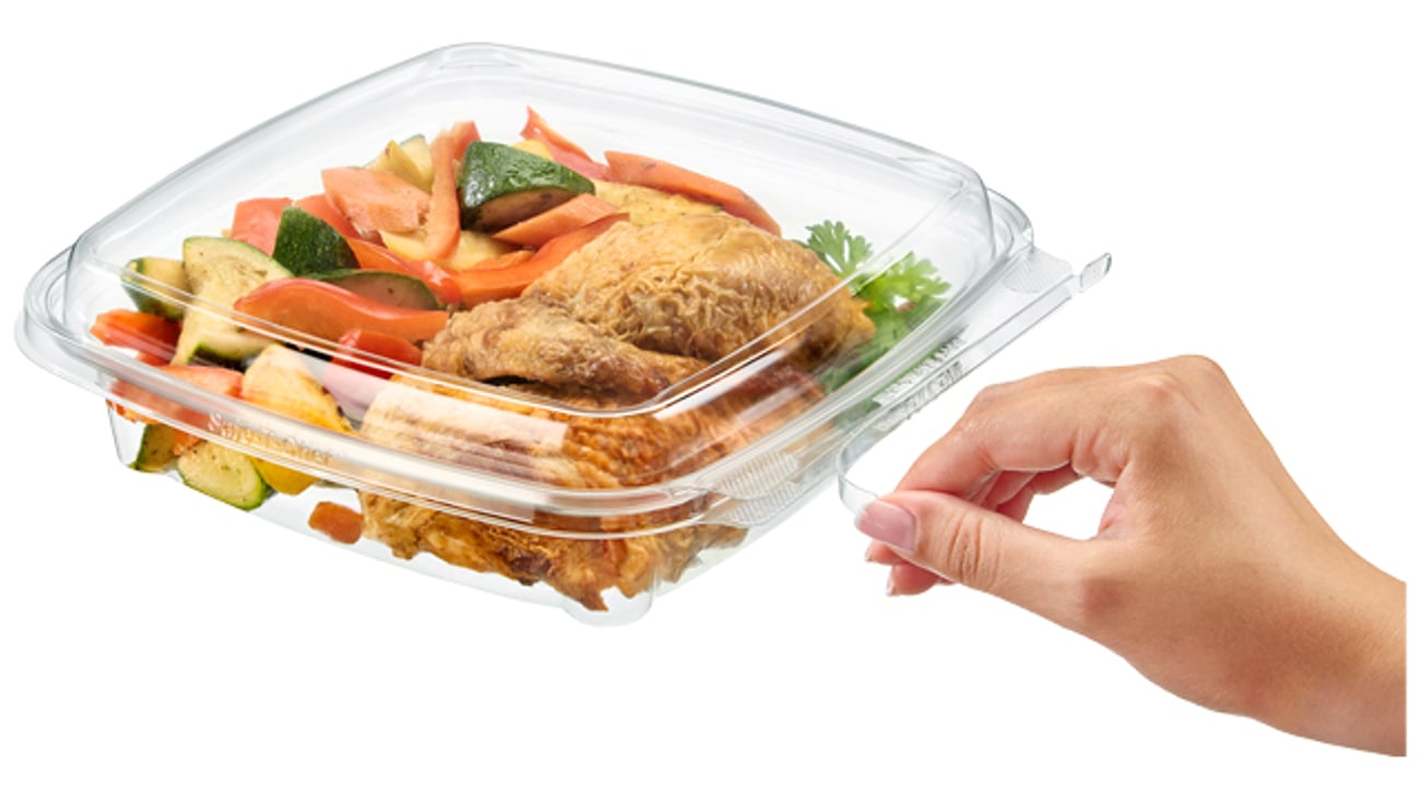 A person opening a Inline Plastics Safe-T-Chef 9x9 container that holds fried chicken