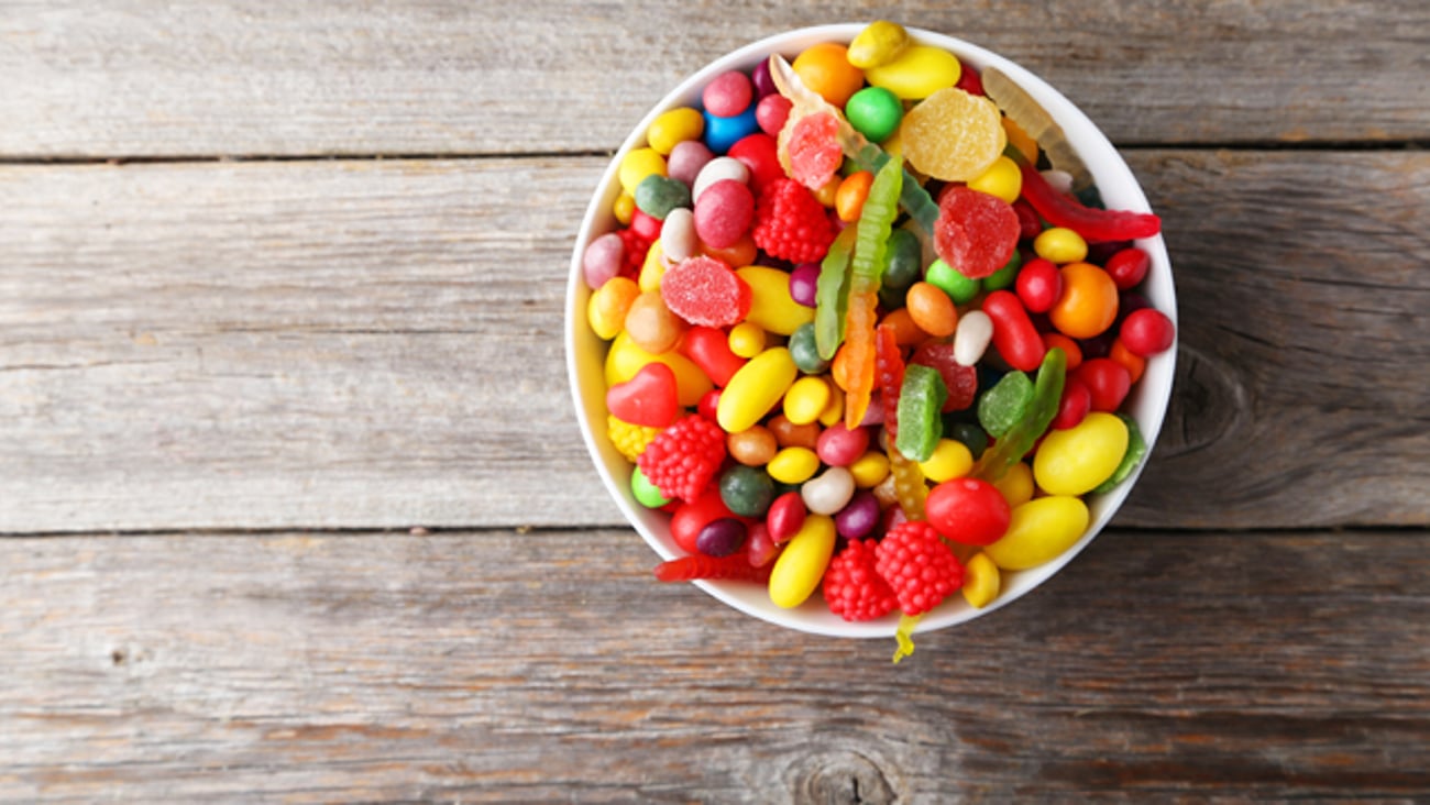 A bowl of nonchocolate candy like gummi worms