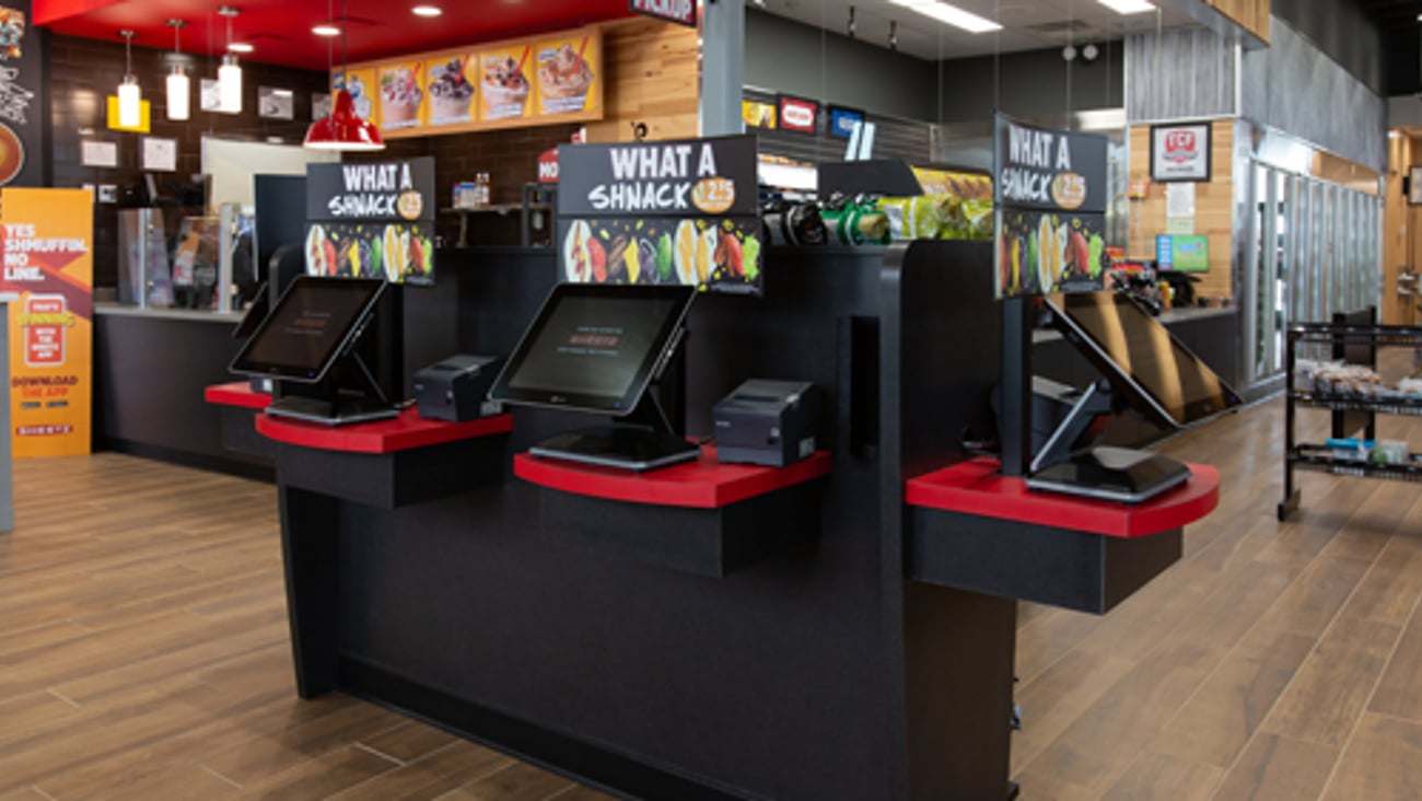 Touchscreen order kiosks inside a Sheetz convenience store