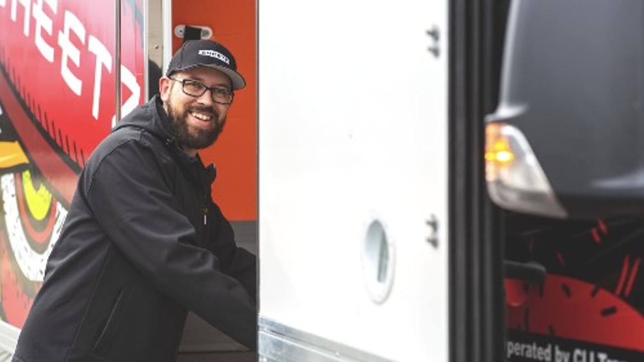 A Sheetz truck driver standing by his cab