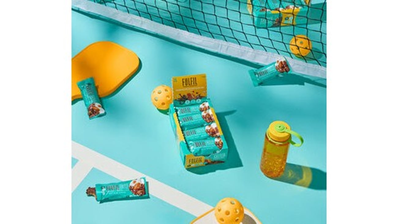 Box of Fulfil Bars on a Pickleball court 