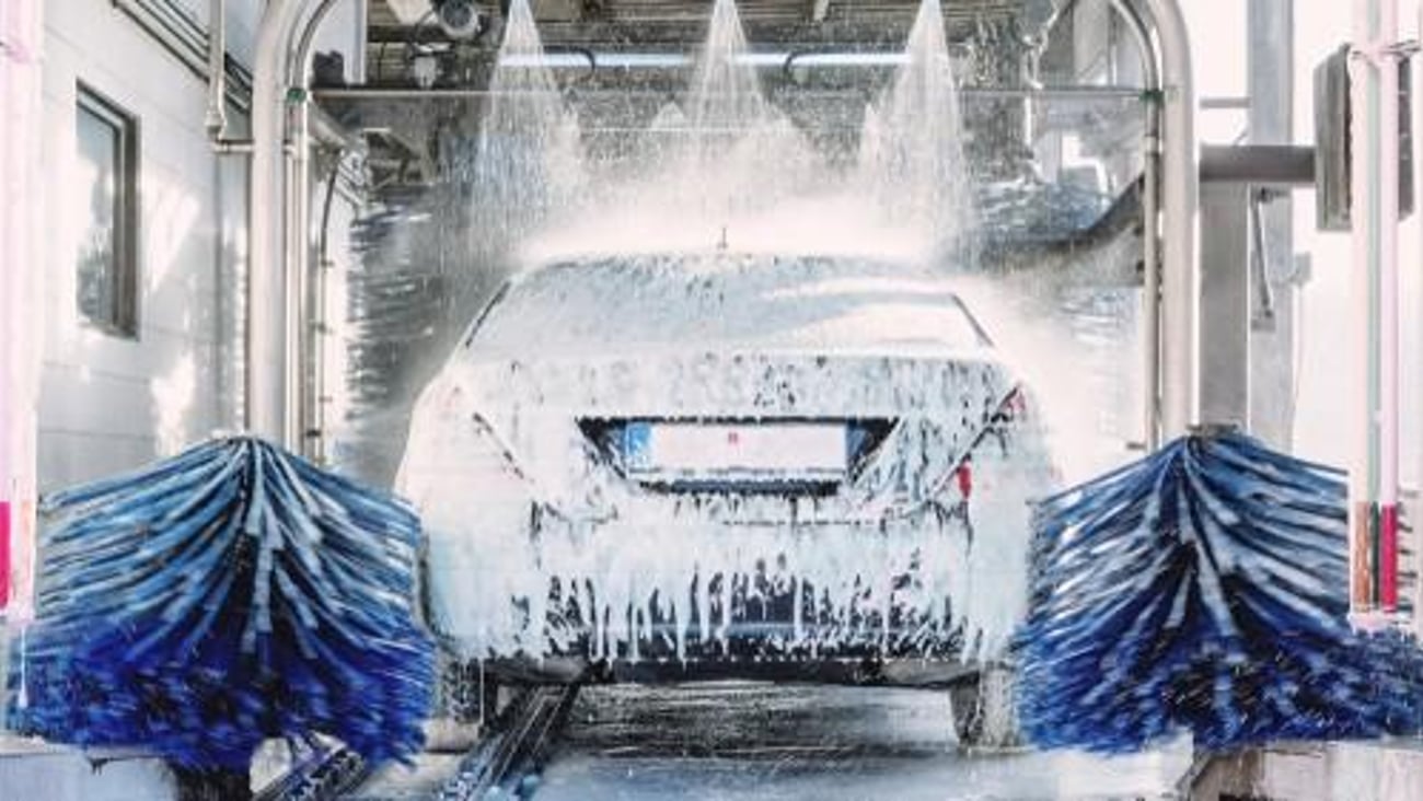 A soapy car in a car wash