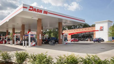 The exterior of a Dash In convenience store and gas station