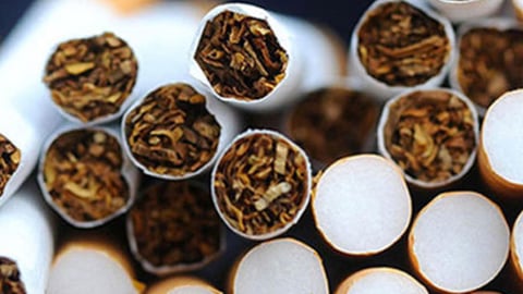 An image of cigarettes stacked on top of each other