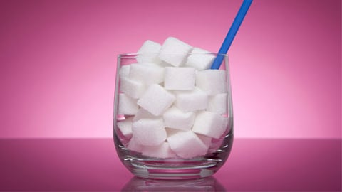 glass with sugar cubes