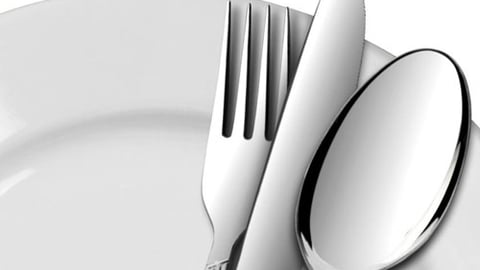 dinner plate with fork, knife and spoon