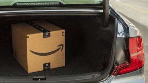 Amazon box in truck of car