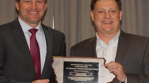 Doug Beech, legal counsel and director of public affairs for Casey's General Stores, accepted the Ethanol Marketing Award from Iowa Secretary of Agriculture Mike Naig.