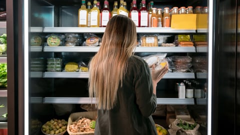 A shopper a fresh food display