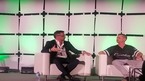 Jacopo D'Alessandris, president and CEO of E-Alternative Solutions, discusses CBD on a panel moderated by Cannapids CEO Case Mandel (r).