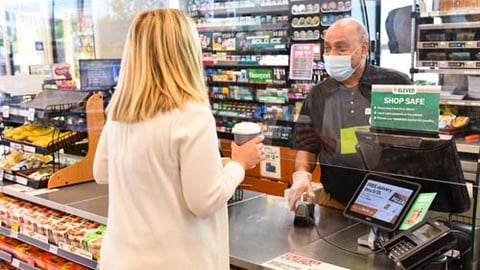 An employee at a 7-Eleven convenience store