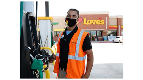 A Love's employee wearing a mask