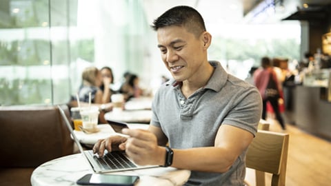 A tech-savvy guy at a restaurant