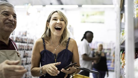 a happy shopper at a convenience store