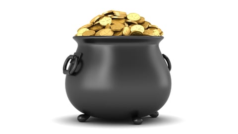 A black pot with cannabis shaped gold coins