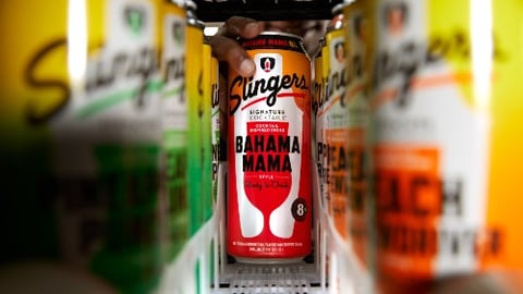 Slingers Signature Cocktails getting put in a refrigerator