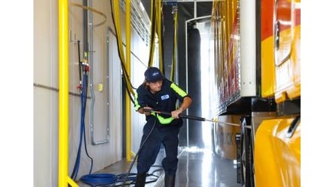 Attendant washing truck at a Love's Travel Stop