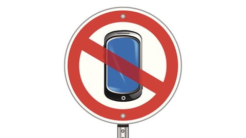 A cell phone ban sign