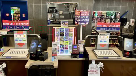 Self-checkout kiosks at a Wesco store