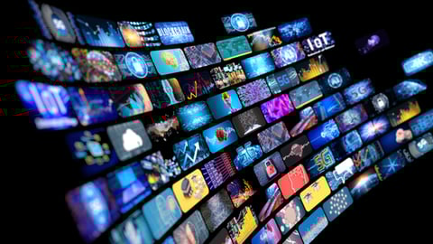 Numerous screens showing technology symbols like IoT