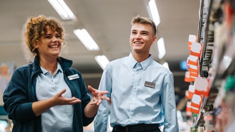 Two co-workers in a retail store