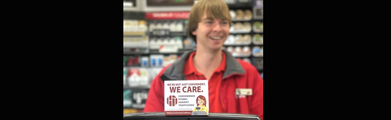 We Care human trafficking sticker at checkout