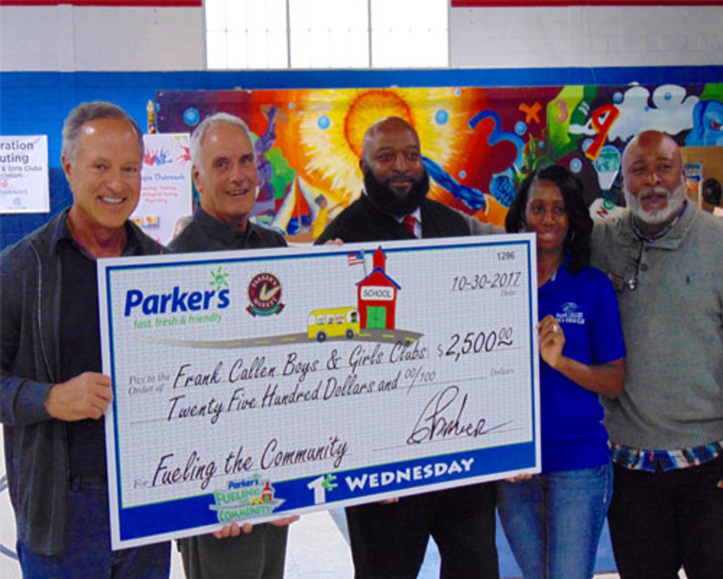 Parker's presents Boys and Girls Club with a $2,500 check