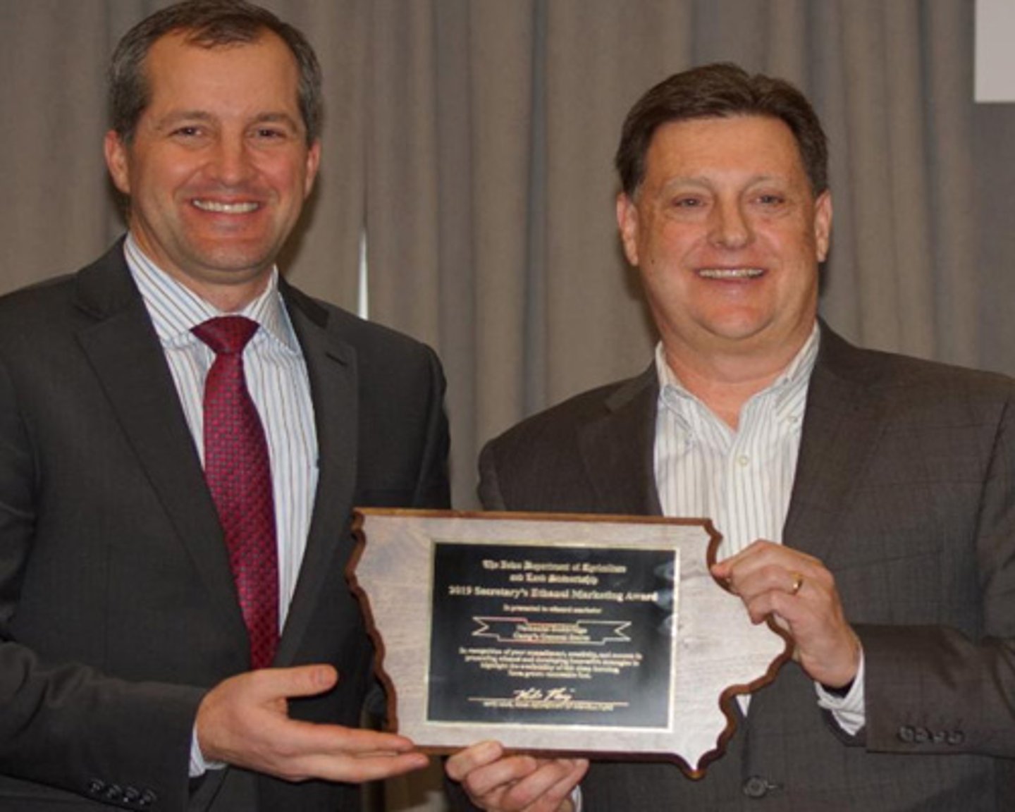 Doug Beech, legal counsel and director of public affairs for Casey's General Stores, accepted the Ethanol Marketing Award from Iowa Secretary of Agriculture Mike Naig.