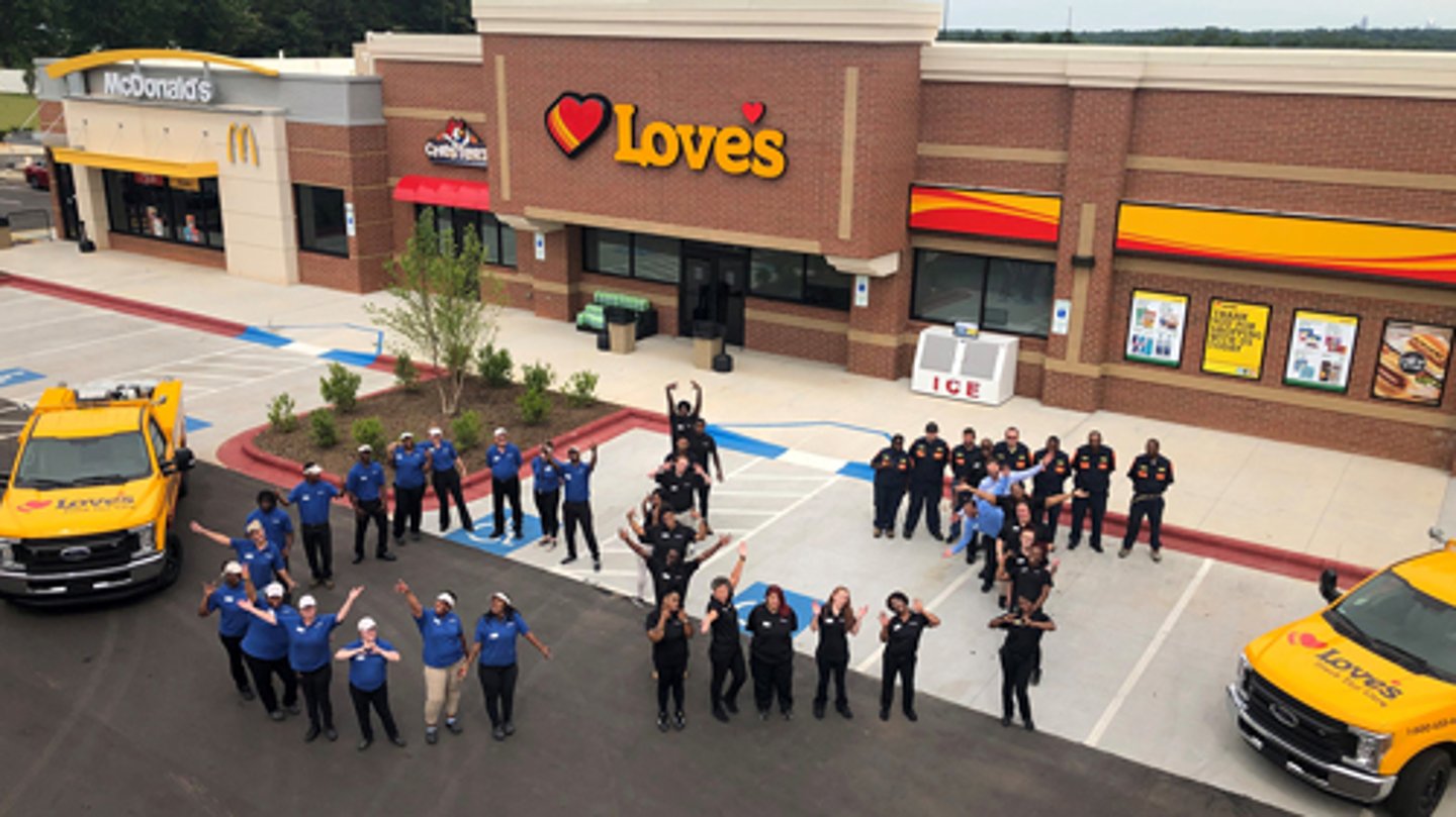 Love's team members welcome customers at a new travel stop in Charlotte, N.C.