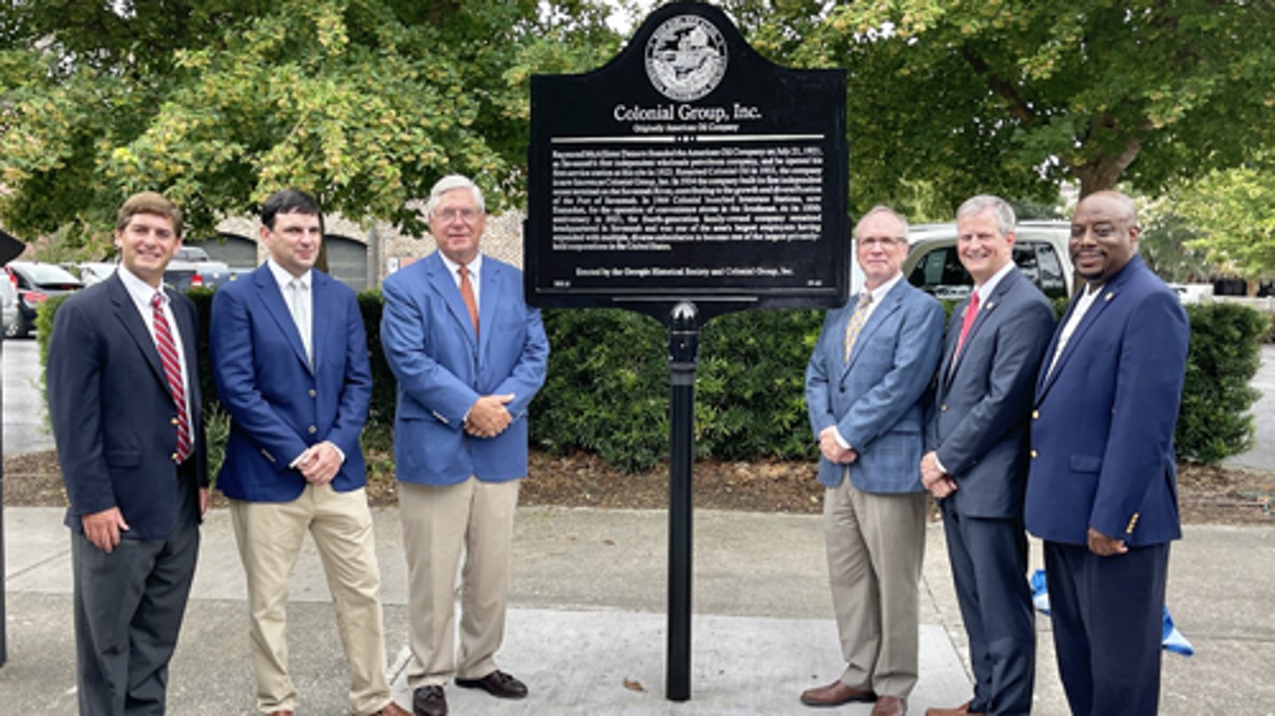 Colonial Group unveils a historical marker to celebrate a century in business. 