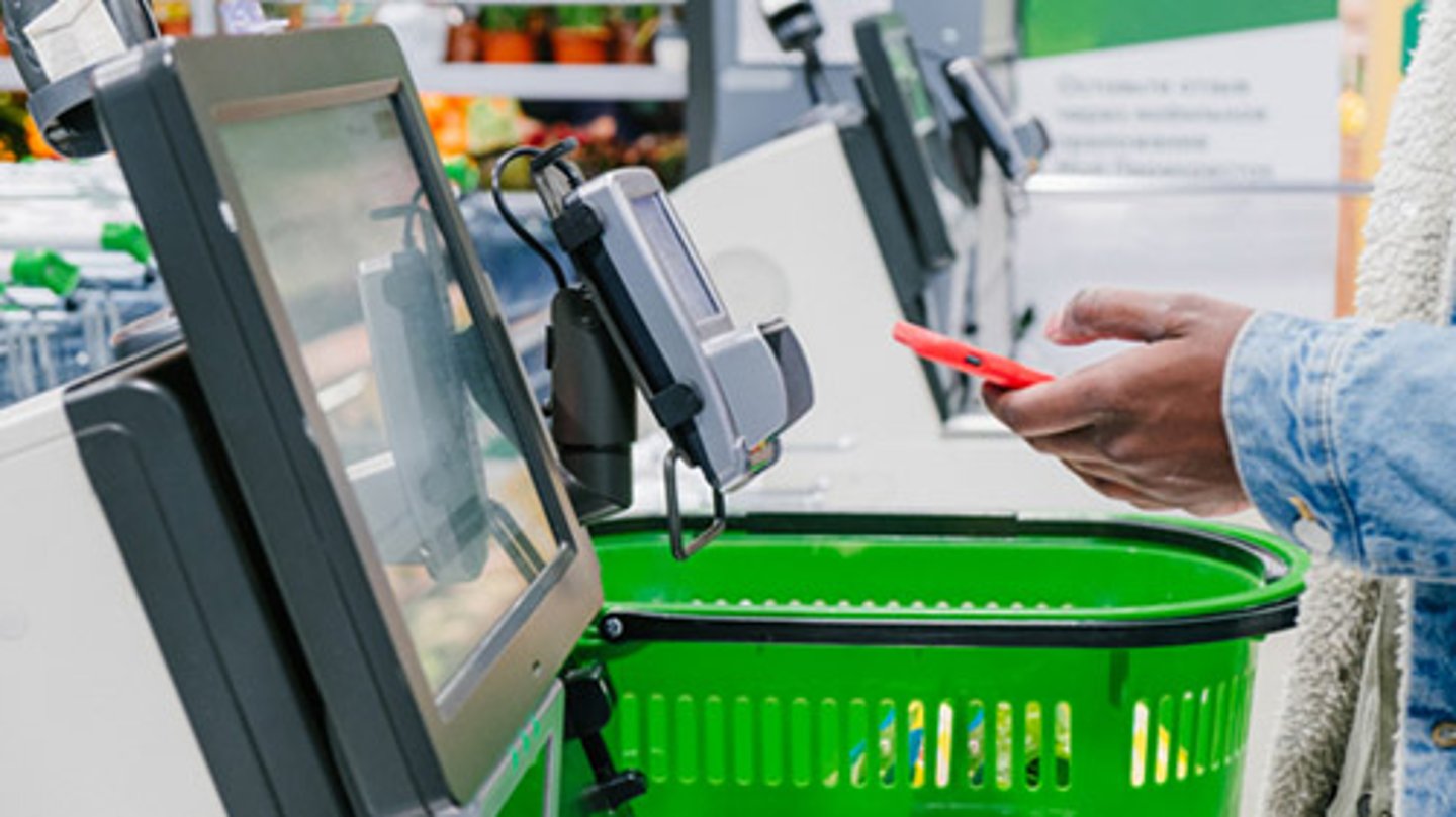 A customer at self-checkout